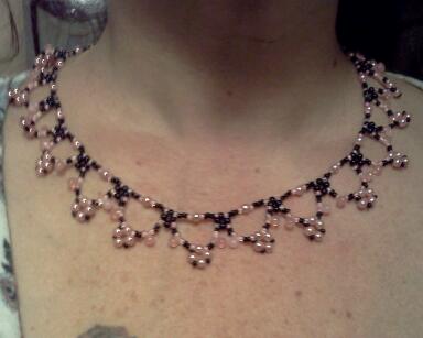 pink and black necklace